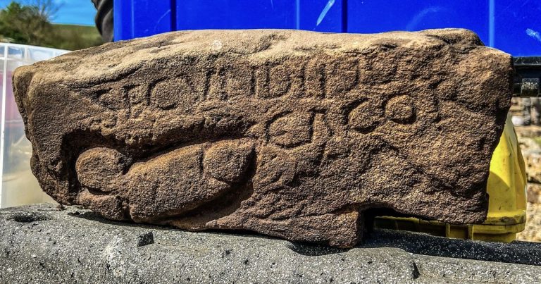 Archaeologist digs up 1,800-year-old stone carved with penis graffiti