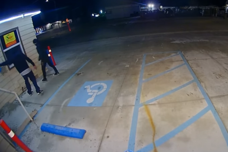 Men caught on fire while burning an immigration center in California