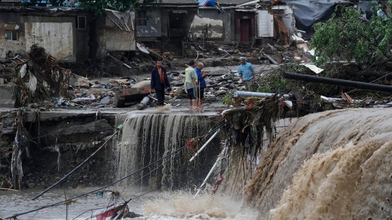 Flooding Strikes Beijing, Leaving 11 Dead and 27 Missing