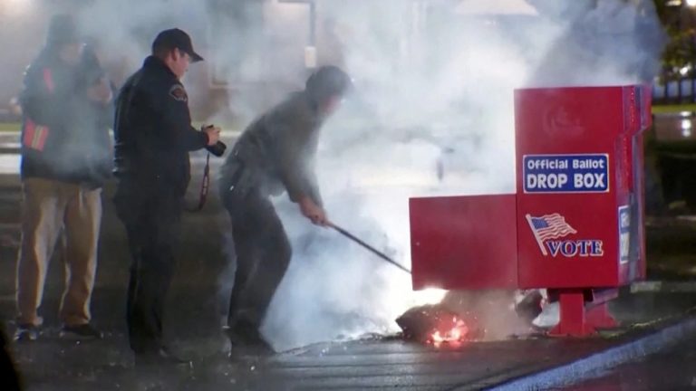 US Election: Voters Urged to Verify Ballot Status After Drop Box Arson