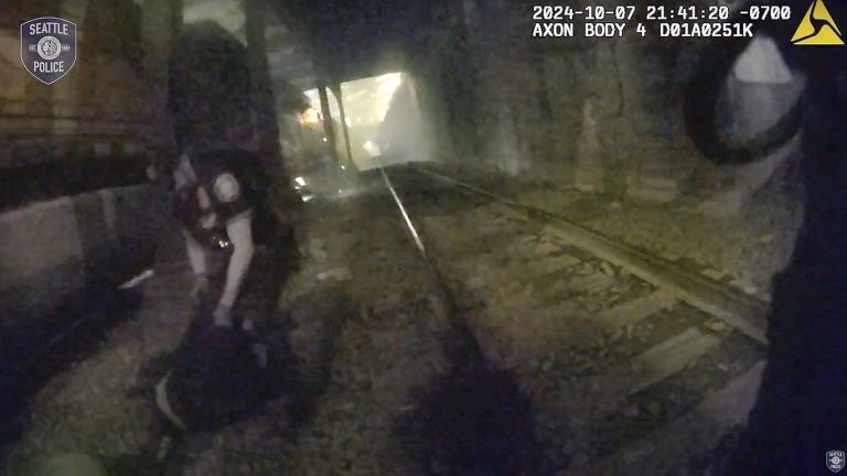 Seattle Officer Rescues Injured Man from Oncoming Train with Seconds to Spare