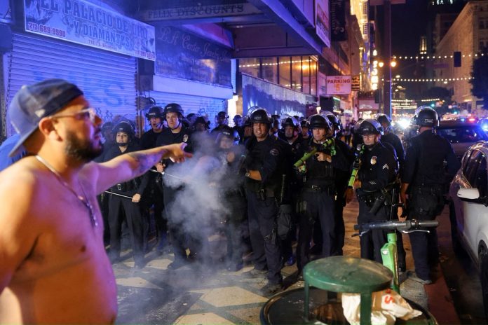 Dodgers Fans Clash with Police Amid World Series Celebration